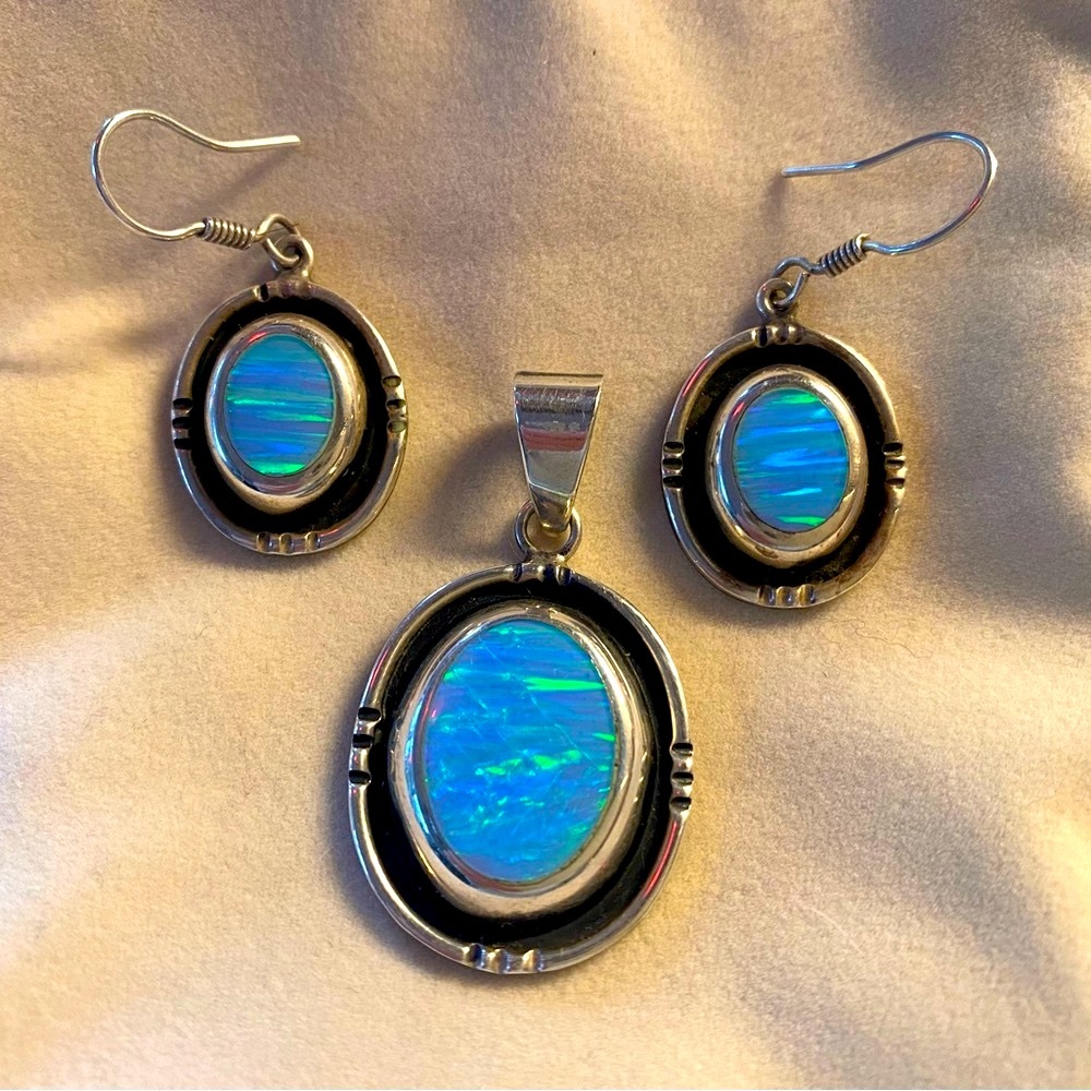 Beautiful Sterling silver and Opal Necklace with matching earrings.